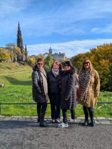 Friends in Edinburgh. AI has been used to add Gillian into the picture