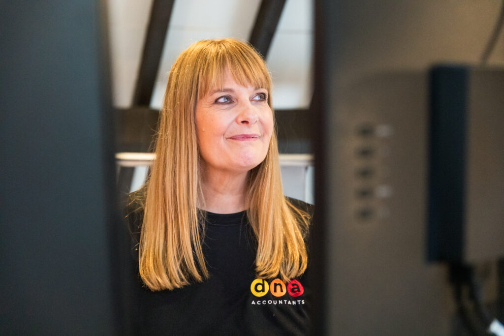 Woman thinking about alphabet shares structure dividends for family businesses