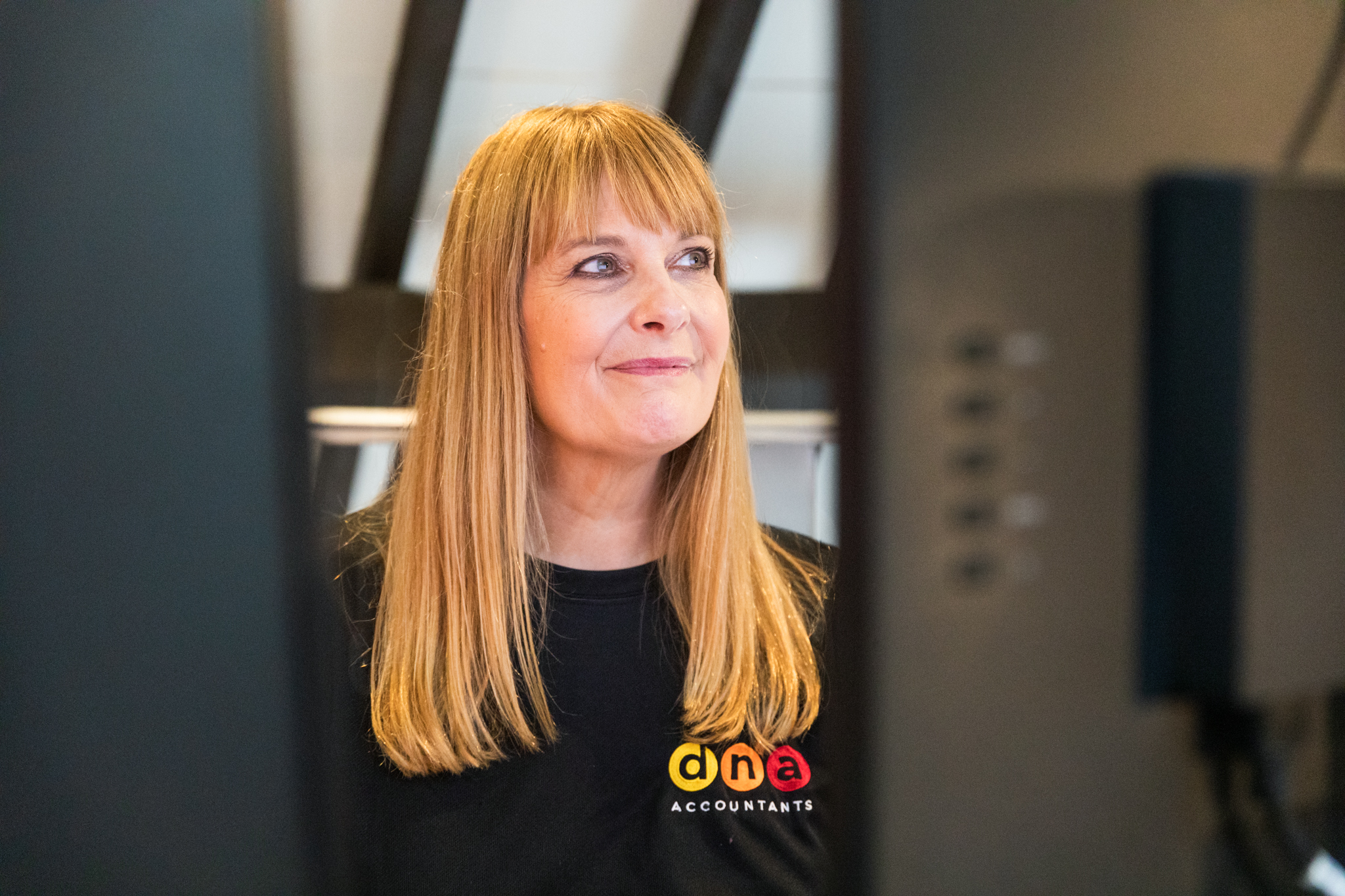 Woman thinking about alphabet shares structure dividends for family businesses