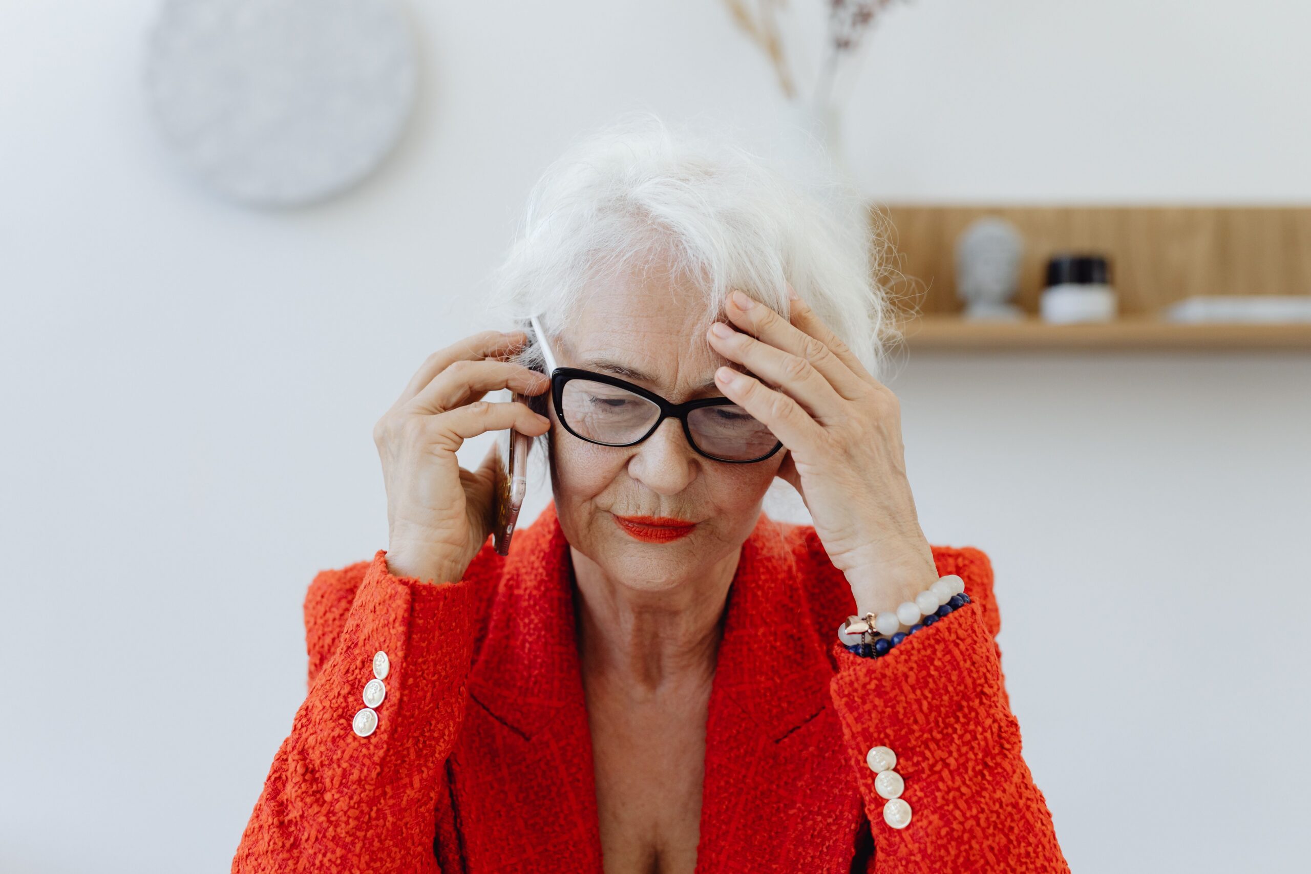 Woman on the phone thinking about is Your £2 Million Estate Facing an Inheritance Tax Trap?